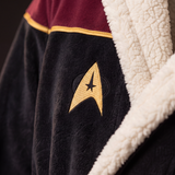 Gold delta badge and burgundy yoke close-up